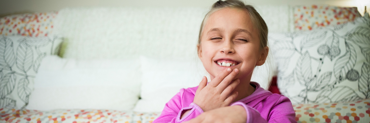 Girl with sight loss smiling