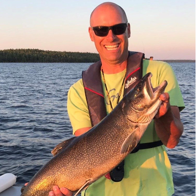 Barry Quick holds a giant fish he caught 