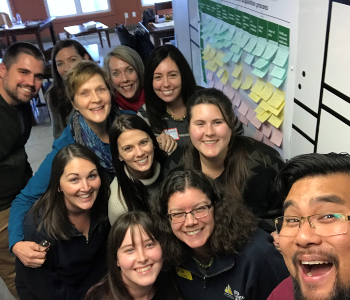 CNIB Lake Joe Staff members pose for a selfie-group photo.