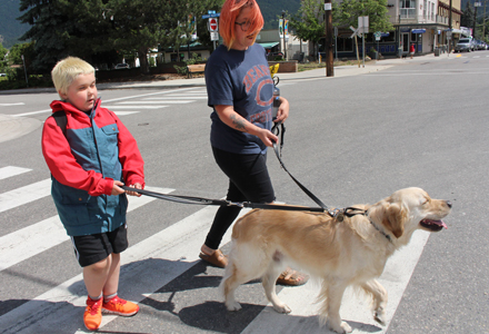 Marco and Baker crossing the street