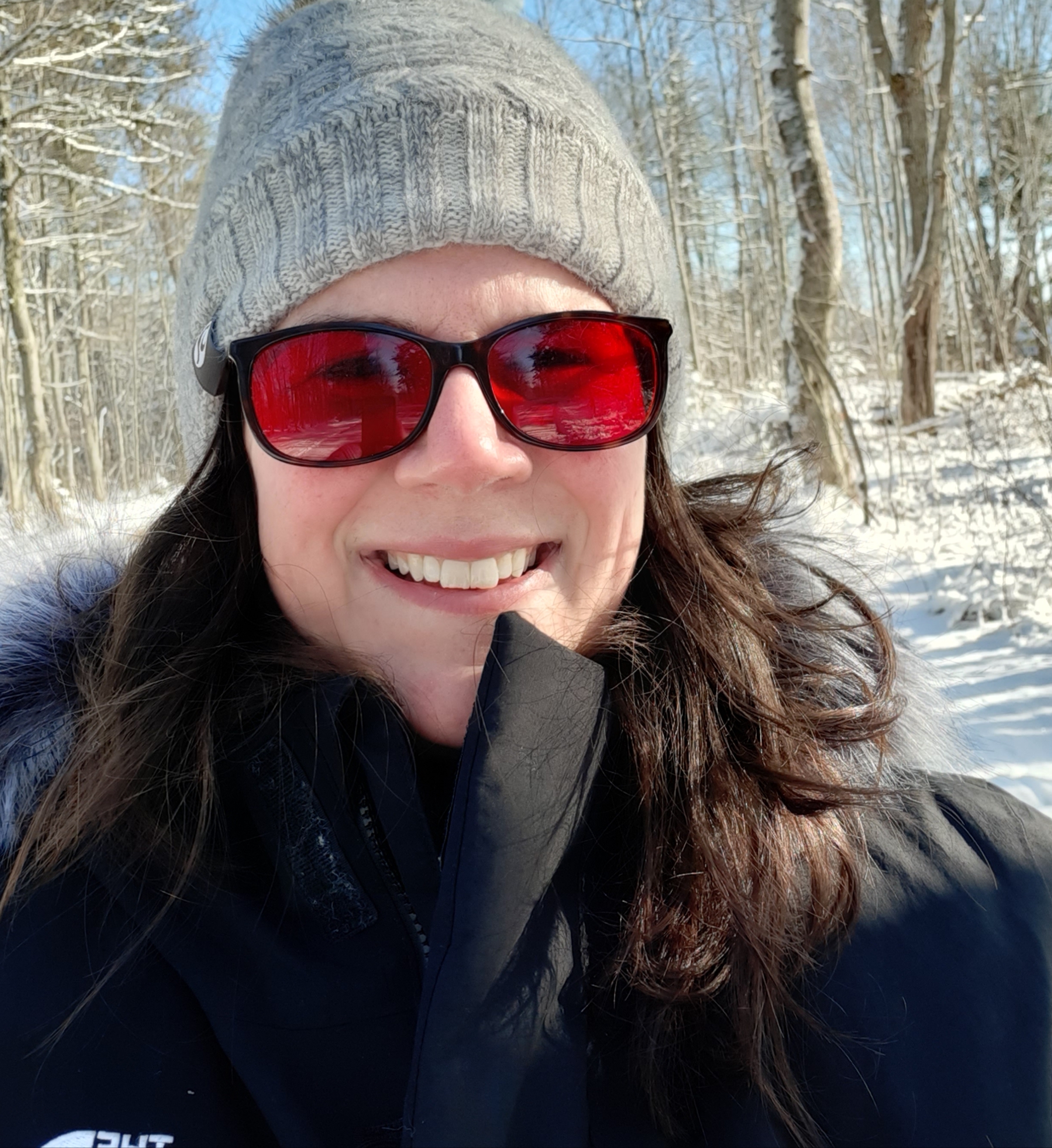 A selfie photograph of Joline Larad smiling.