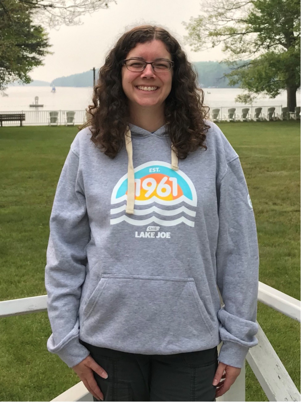 CNIB Lake Joe staff member wearing CNIB Lake Joe 60th anniversary hoodie