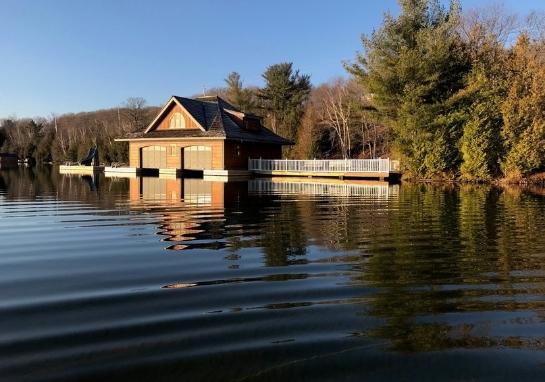 Photo of the boathouse taken from the lakeshore