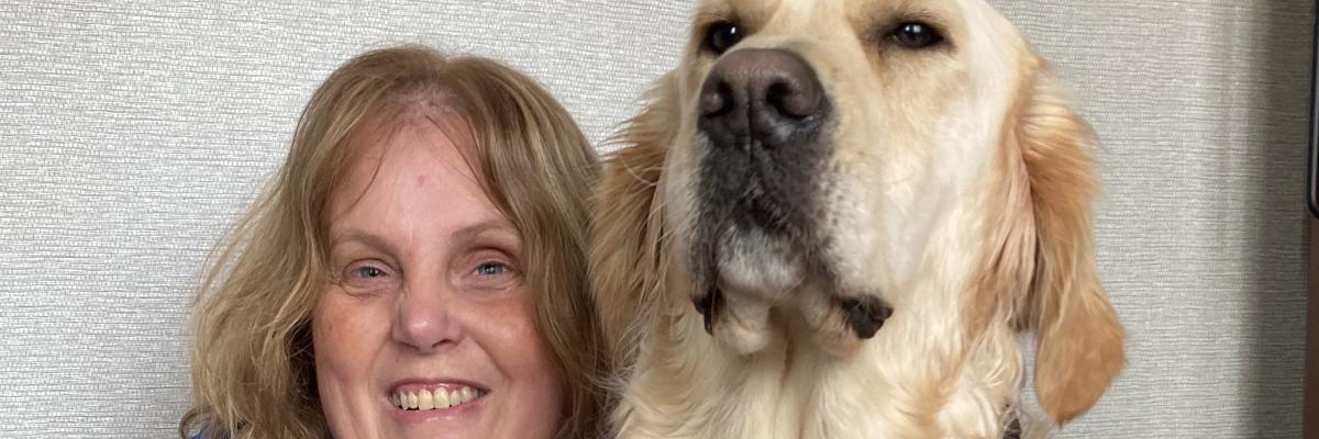 Chris Trudell-Conklin and her guide dog, Cody, a 2-year-old golden retriever.