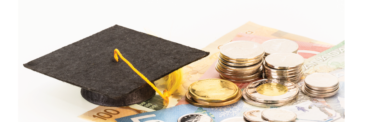 A graduation cap with tassel sits atop a stack of Canadian currency: bills and stacks of coins.
