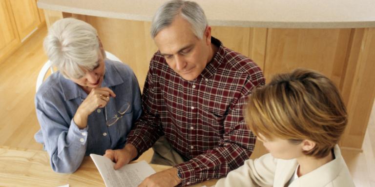 Couple consulting with financial advisor