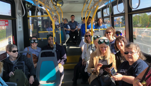 Moncton residents sitting on a bus as part of CNIB’s Get on Board Campaign. 