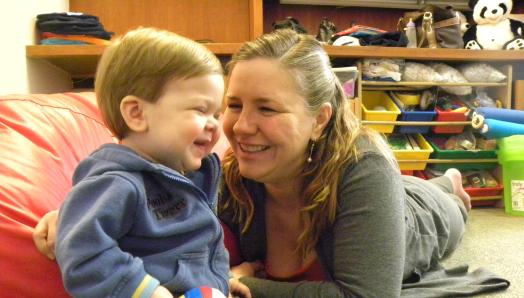 Boy and mother smiling 